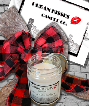 Red bow with soy vanilla candle handmade in Canada with Urban Kisses Candle Company sign